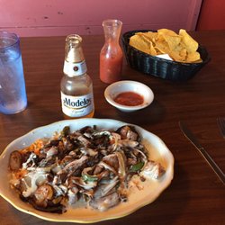 Casa Fiesta - San Jose, cerveza, and house made salsa.