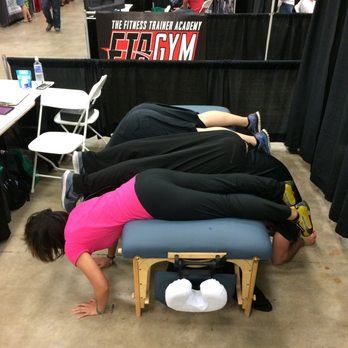 Intuitive Hands - Being silly decompressing our backs at the Naturally Fit Games 2016 - Pilates Near Me - Austin, Texas Intuitive Hands - Being silly decompressing our backs at the Naturally Fit Games 2016 - Pilates Near Me - Austin, Texas