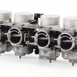 This is my set of perfectly performing Keihin stock carburetors my bike had on that this shop removed to install the broken CR-33 This is my set of perfectly performing Keihin stock carburetors my bike had on that this shop removed to install the broken CR-33