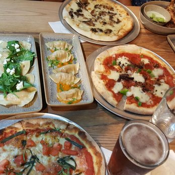 Moku Kitchen - String beans, pot stickers, wings, fries, squash ravioli, dim sum, and Margherita, Proletariat, and Hamakua wild mushroom pizzas. - Cocktail Bars Near Me - Honolulu, Hawaii