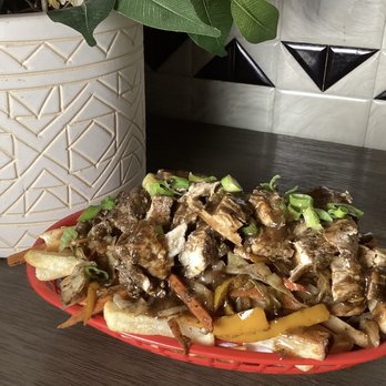 Simply Loaded - a plate of food on a table - Food Trucks Near Me Simply Loaded - a plate of food on a table - Food Trucks Near Me