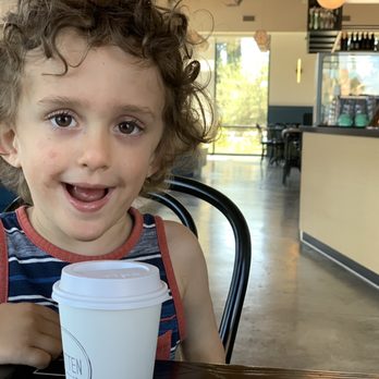 Cafe Smitten - My son enjoying hot chocolate-- you'd be smiling too - Breakfast & Brunch Near Me - Bakersfield, California