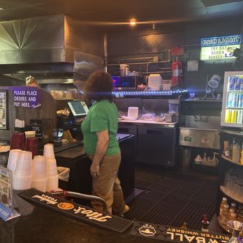Beachcorner Bar & Grill - Burgers are made to order and you can see how clean the kitchen area is kept - Lounges Near Me - New Orleans, Louisiana