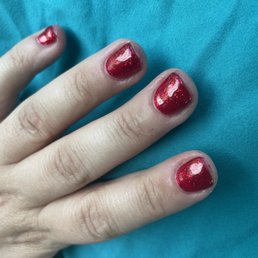 Gel manicure with nail polish all over my fingertips.