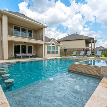 Luxe Outdoors - a pool in a backyard - General Contractors Near Me - Cypress, Texas Luxe Outdoors - a pool in a backyard - General Contractors Near Me - Cypress, Texas