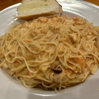 Olive Branch Cafe - Yummy PASTA WITH SEAFOOD SAUCE with chicken added and angel hair pasta! - Pizza Near Me - New Orleans, Louisiana Olive Branch Cafe - Yummy PASTA WITH SEAFOOD SAUCE with chicken added and angel hair pasta! - Pizza Near Me - New Orleans, Louisiana