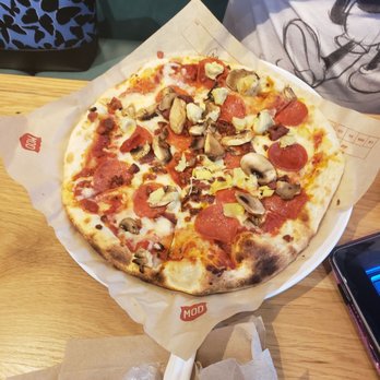 MOD Pizza - Pizza with garlic, pepperoni, bacon,  mushrooms and artichoke - Pizza Near Me - Orlando, Florida
