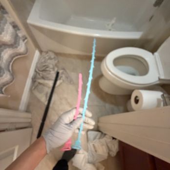 Home Leak and Drain Solutions - The pink piece that broke off - Plumbing Near Me