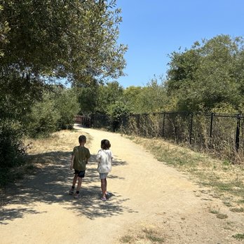Neary Lagoon - Brother and sister walking on a dirt path - Parks Near Me - Santa Cruz, California Neary Lagoon - Brother and sister walking on a dirt path - Parks Near Me - Santa Cruz, California