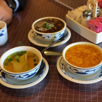 Szechuan Empire - Our trio of soups - hot and sour at the top, wonton (with the wonton, duh), and egg drop. The egg drop was by far the best. - Chinese Near Me - Livonia, Michigan