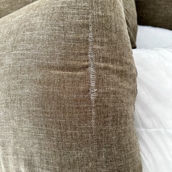 Gaby's Feather And Down - before photo of a couch pillow after washing it. - Furniture Reupholstery Near Me - Los Angeles, California Gaby's Feather And Down - before photo of a couch pillow after washing it. - Furniture Reupholstery Near Me - Los Angeles, California