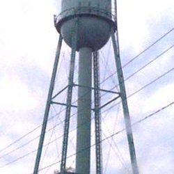 Ammo Bee & Guns - Look for the Caledonia Water tower across the street.