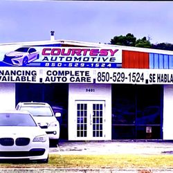 Courtesy Automotive - Our Auto Repair shop. Michael does a great job working on all our luxury cars.