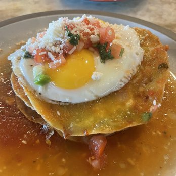 Otro Cafe - Chilaquiles    choice of chicken or vegetables baked layered tortillas, oaxaca cheese, two eggs any style, red or green sauce - Mexican Near Me - Phoenix, Arizona