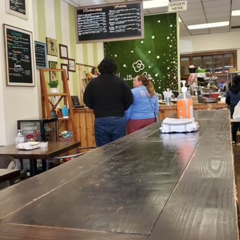 Healthy Bite - a couple of people in a restaurant - Juice Bars & Smoothies Near Me - El Paso, Texas