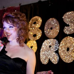 Allegria Auctions - "Like totally tubular!" 80s prom theme at school auction with auctioneer Jennifer Bolton.