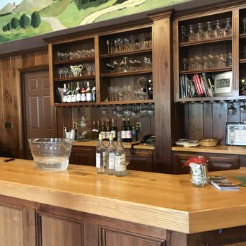 Fridays Creek Winery - a bar with wine glasses on the counter - Wineries Near Me - Owings, Maryland Fridays Creek Winery - a bar with wine glasses on the counter - Wineries Near Me - Owings, Maryland