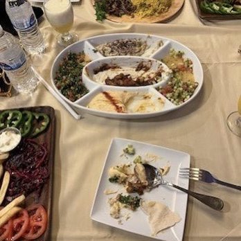 Caroun Restaurant - Sampled plate and coconut juice. - Mediterranean Near Me - Phoenix, Arizona Caroun Restaurant - Sampled plate and coconut juice. - Mediterranean Near Me - Phoenix, Arizona