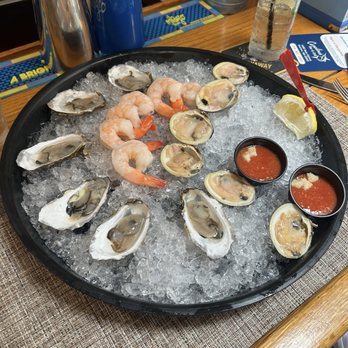 Carolines Bar and Grill - Happy hour raw bar $1 buck a shuck, shrimp, little necks and Welfleet oysters. - Seafood Near Me - North Eastham, Massachusetts
