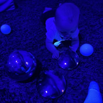 Mendo Leap - Black light 6 month old playing on the floor - Indoor Playcenter Near Me - Ukiah, California Mendo Leap - Black light 6 month old playing on the floor - Indoor Playcenter Near Me - Ukiah, California