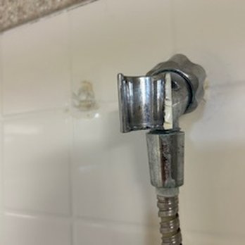 Embassy Suites by Hilton Lubbock - Not only is the shower head holder broken, it's disgusting - anchor holes, like to the left of holder were all over the wall - Hotels Near Me - Lubbock, Texas Embassy Suites by Hilton Lubbock - Not only is the shower head holder broken, it's disgusting - anchor holes, like to the left of holder were all over the wall - Hotels Near Me - Lubbock, Texas