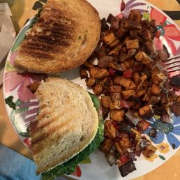 Tomato mozzarella pesto panini and sweet potato hash