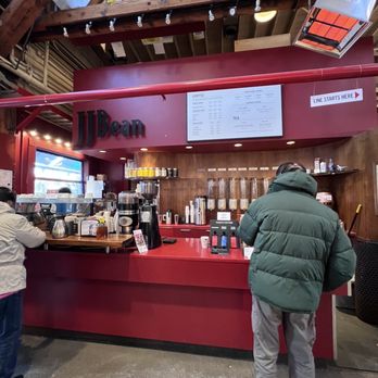 JJ Bean Coffee Roasters - two people standing at the counter - Coffee & Tea Near Me - Vancouver, British Columbia JJ Bean Coffee Roasters - two people standing at the counter - Coffee & Tea Near Me - Vancouver, British Columbia
