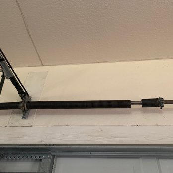 C&W doors - Broken garage door springs - Garage Door Services Near Me