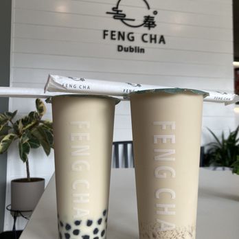 Feng Cha Tea House - Dark roasted oolong milk tea (lite sweet - 25%, no ice) w/ boba & Iron Goddess (Tieguanyin) milk tea (no ice , no sugar) w/ crystal boba - Bubble Tea Near Me - Dublin, California Feng Cha Tea House - Dark roasted oolong milk tea (lite sweet - 25%, no ice) w/ boba & Iron Goddess (Tieguanyin) milk tea (no ice , no sugar) w/ crystal boba - Bubble Tea Near Me - Dublin, California