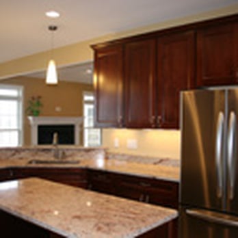 Leader Construction - a kitchen with stainless steel appliances - General Contractors Near Me - Saint Charles, Missouri Leader Construction - a kitchen with stainless steel appliances - General Contractors Near Me - Saint Charles, Missouri