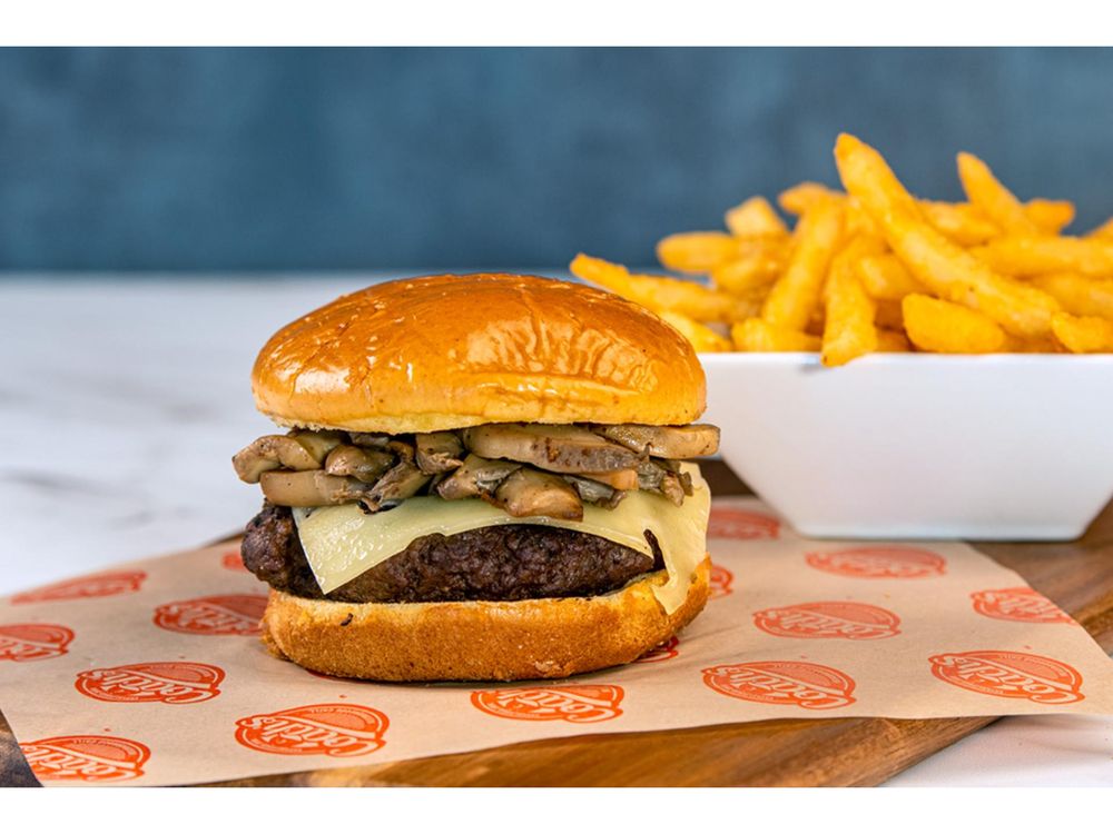 Coach's Neighborhood Grill Logo
