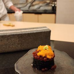 Omakase course - uni, fish roe and tuna Omakase course - uni, fish roe and tuna