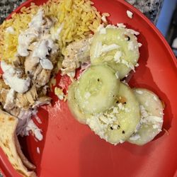 Gyros King - Plated at home chicken and salad cucumber