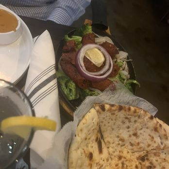 Tikka Indian Cuisine - Lamb kebabs and garlic naan - Indian Near Me - Venice, Florida Tikka Indian Cuisine - Lamb kebabs and garlic naan - Indian Near Me - Venice, Florida