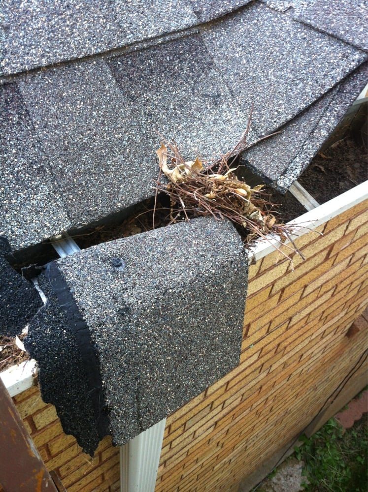 Slide of Whittle's Roofing