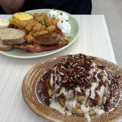 Big breakfast with tater tot's and pancake.