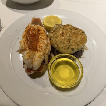 Eddie V's Prime Seafood - 10 oz Center Cut Filet Mignon and 5oz Roasted South African Lobster Beurre Blanc - Seafood Near Me - Charlotte, North Carolina Eddie V's Prime Seafood - 10 oz Center Cut Filet Mignon and 5oz Roasted South African Lobster Beurre Blanc - Seafood Near Me - Charlotte, North Carolina