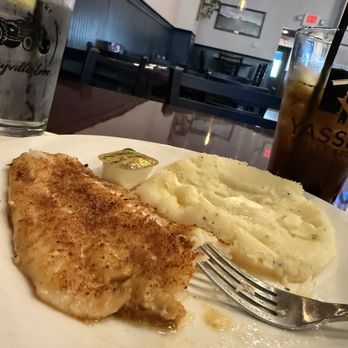 Caryville Inn - Cajun broiled fish with mashed potatoes!  Had taken 2 bites! - Hotels Near Me - Oakfield, New York
