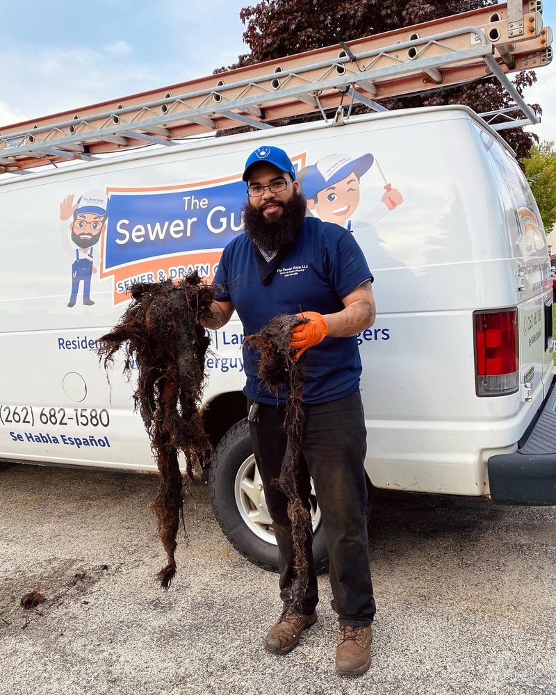 Slide of The Sewer Guys