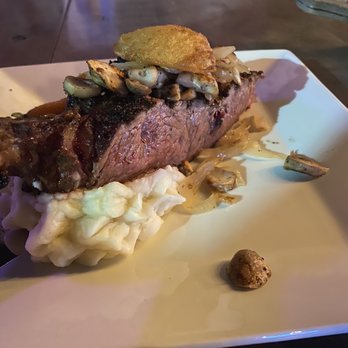 The Parlor - Half of a Cowboy ribeye - medium rare - Salad Near Me - Reno, Nevada The Parlor - Half of a Cowboy ribeye - medium rare - Salad Near Me - Reno, Nevada
