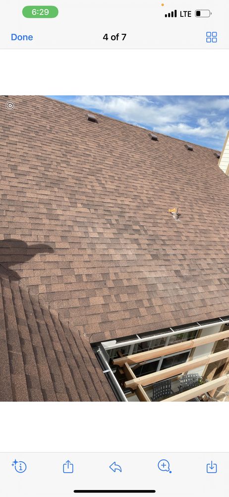 Slide of Pioneer Roof Pros