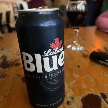 Genna's Lounge - a can of beer on a table - Lounges Near Me - Madison, Wisconsin