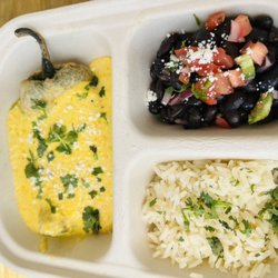 Cha-cho’s Latin Kitchen - Poblano pepper stuffed with cheese , dressing with creamy corn sauce, side of cilantro- lime rice and black beans with pico.