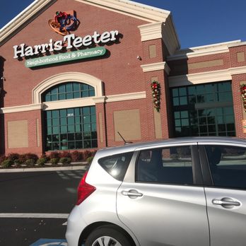 Harris Teeter - a car parked in front of a store - Grocery Near Me - Winston-Salem, North Carolina