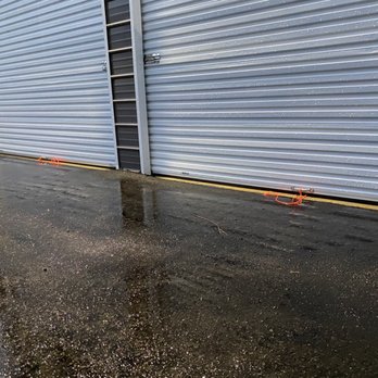 SCC Asphalt Surfaces - The pooling after the "repair". - Masonry/Concrete Near Me - Lula, Georgia