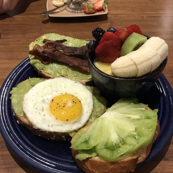 Eight AM - Avocado toast three way with a generous serving of fruit. Thinking of building this into my weekly breakfast routine! - New American Near Me - San Francisco, California Eight AM - Avocado toast three way with a generous serving of fruit. Thinking of building this into my weekly breakfast routine! - New American Near Me - San Francisco, California