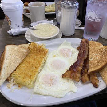 Breakfastime - #2 - 3 eggs over medium, hash browns, white toast, bacon and a side of grits - Breakfast & Brunch Near Me - Clemmons, North Carolina Breakfastime - #2 - 3 eggs over medium, hash browns, white toast, bacon and a side of grits - Breakfast & Brunch Near Me - Clemmons, North Carolina