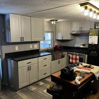 Dwyer’s Diversified Services - Kitchen remodel with new flooring and real farmhouse sink - General Contractors Near Me Dwyer’s Diversified Services - Kitchen remodel with new flooring and real farmhouse sink - General Contractors Near Me