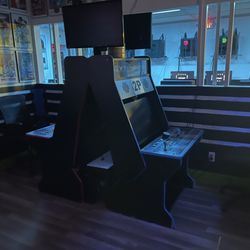 Euphnet Cyber Cafe - Fighting game cabinets for Tekken and Street Fighter 6. Wednesday nights get crazy!