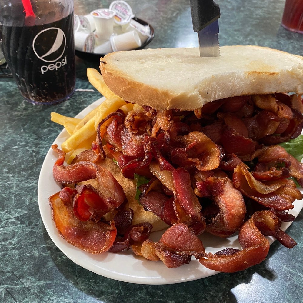 Tony's I-75 Restaurant - One word. BACON. Holy BACON. 1 pound of BACON. Just because you can't see the tomato and can barely see the lettuce this is their BLT. - Diners Near Me - Birch Run, Michigan Tony's I-75 Restaurant - One word. BACON. Holy BACON. 1 pound of BACON. Just because you can't see the tomato and can barely see the lettuce this is their BLT. - Diners Near Me - Birch Run, Michigan
